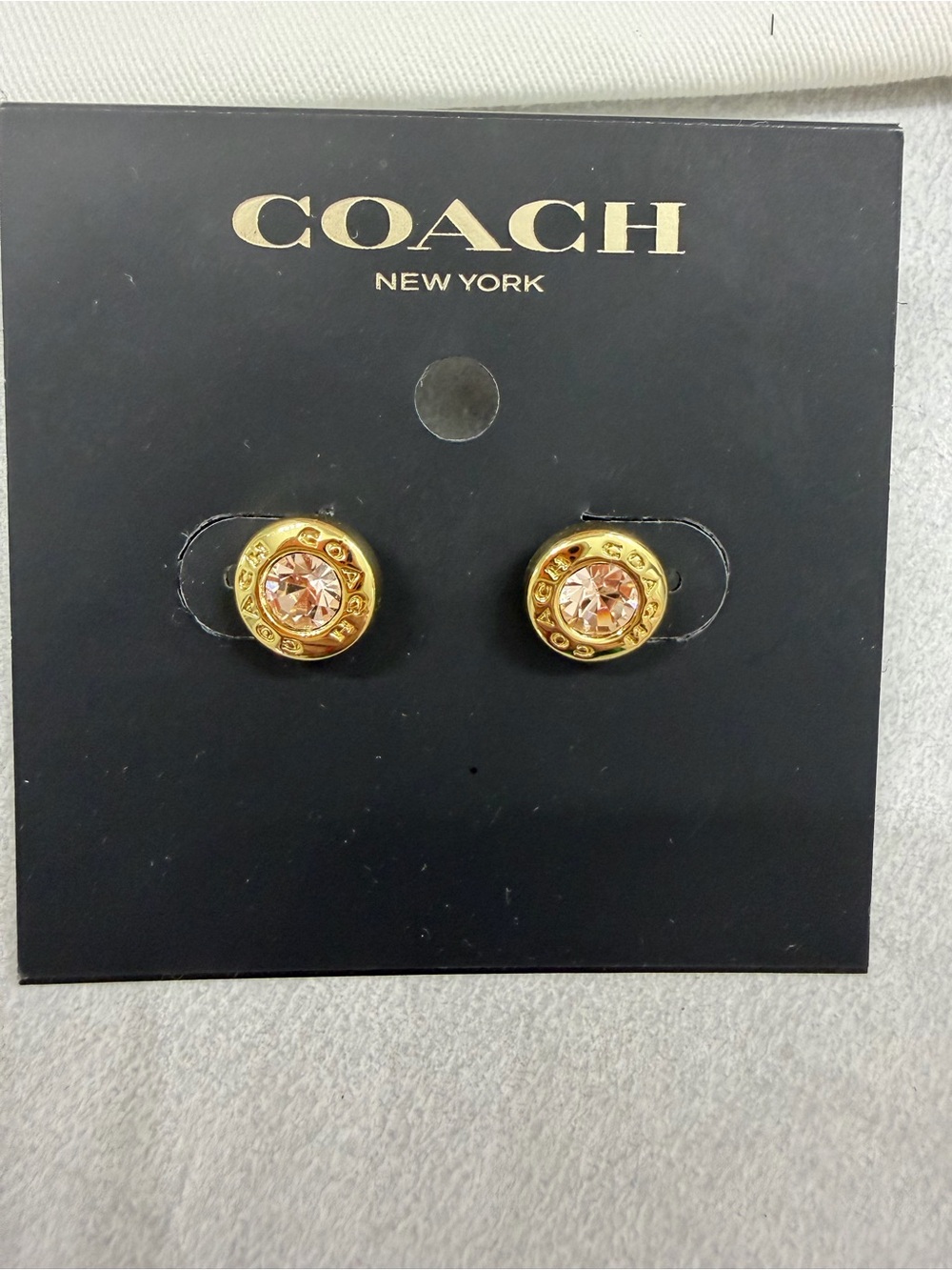 COACH Gold-Tone Earrings with Light Pink Crystal Centers